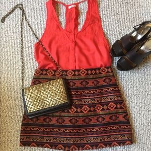Red sleeveless shirt